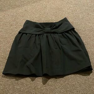 Kate Spade black skirt - kid size L - perfect condition. Bow detail in front.